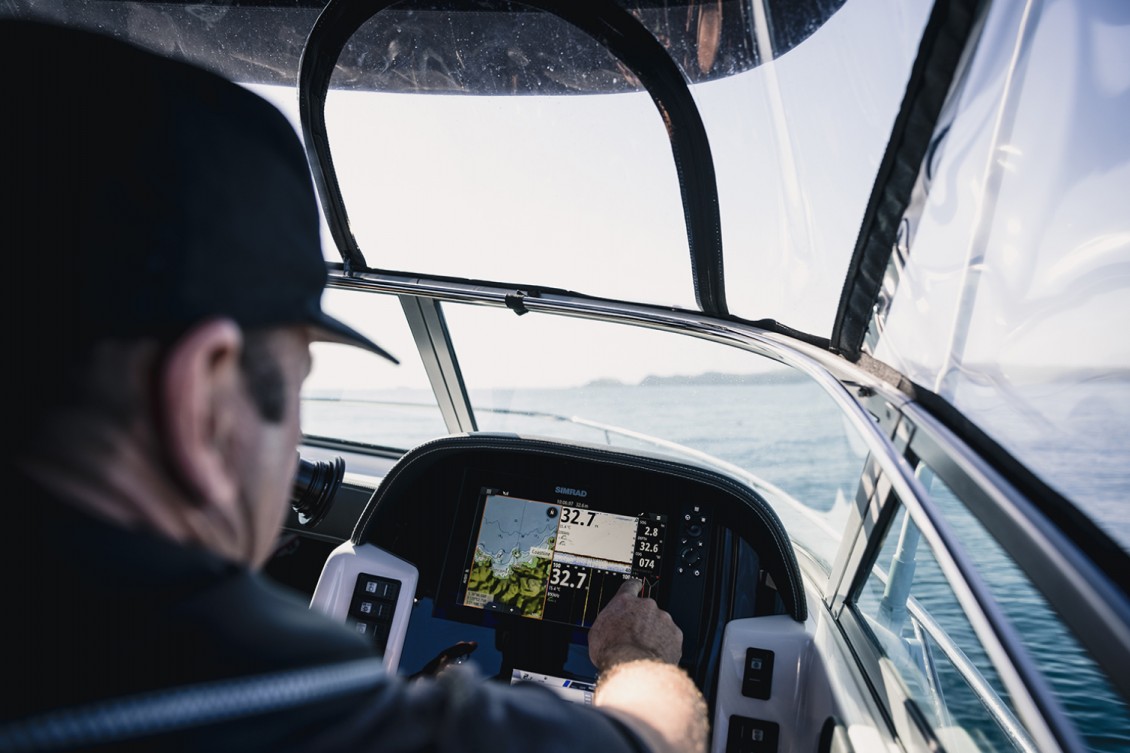 Simrad touch-screen electronics inset into the dash. Gauges and switches within easy reach. | Haines Hunter